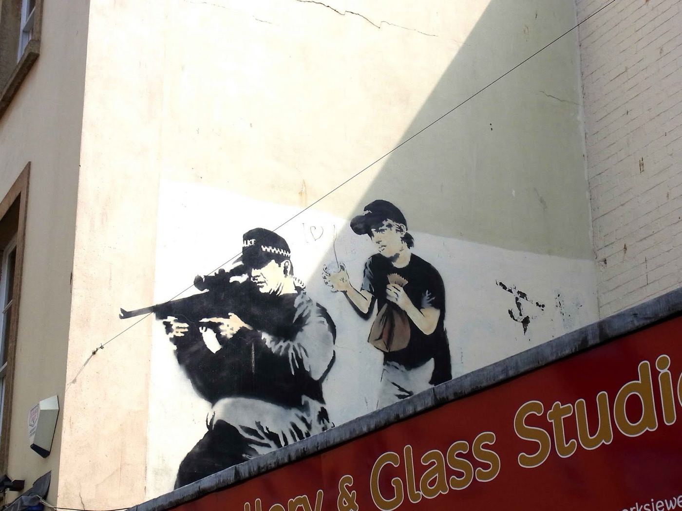 Police Sniper and Paper Bag Boy, Bristol, 2011