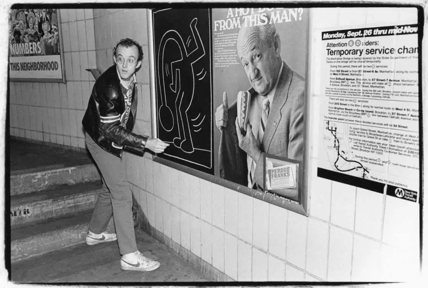 Keith Haring, subway drawing in chalk on an empty advertising panel, New York.