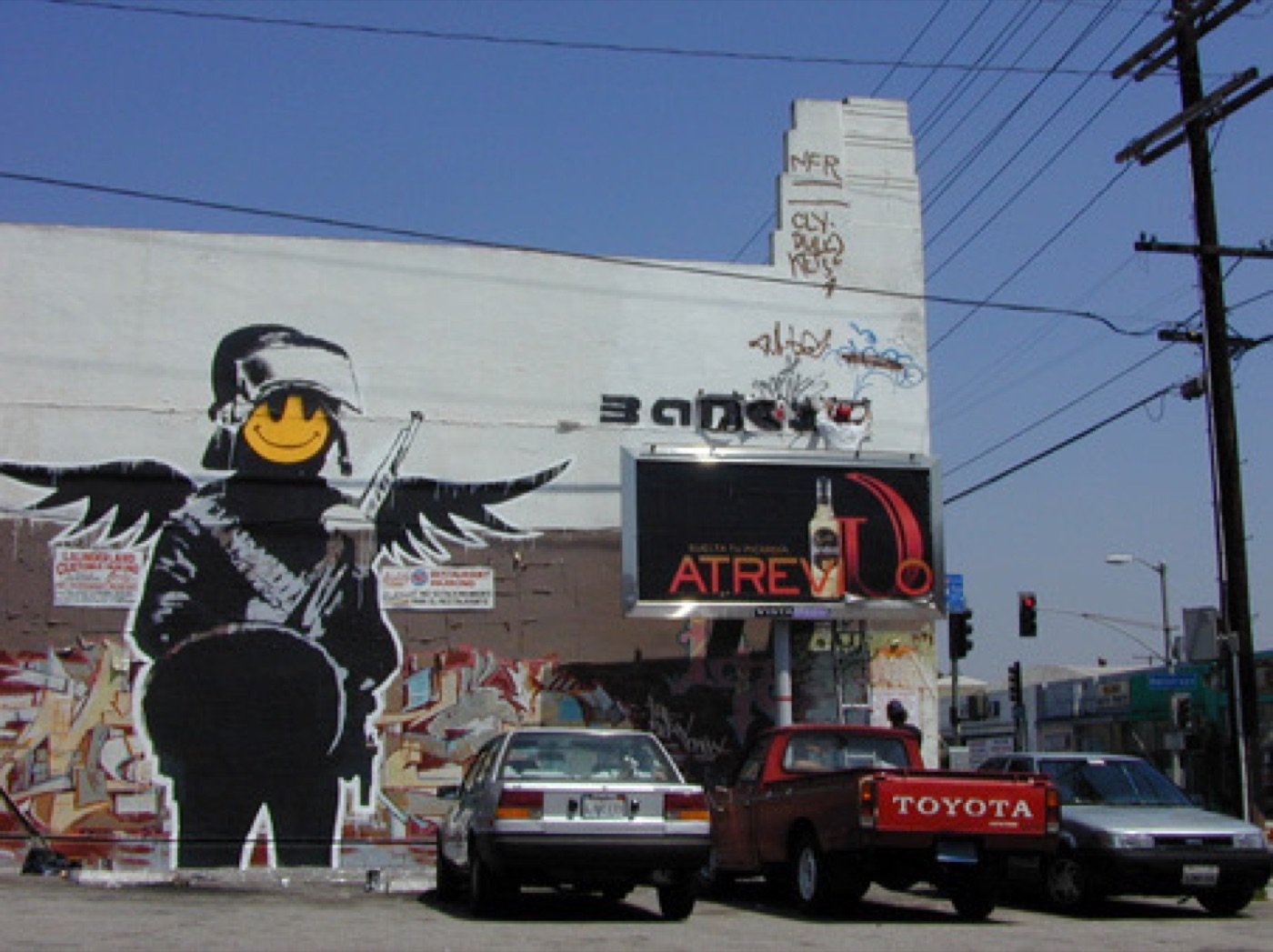 The figure on the street.