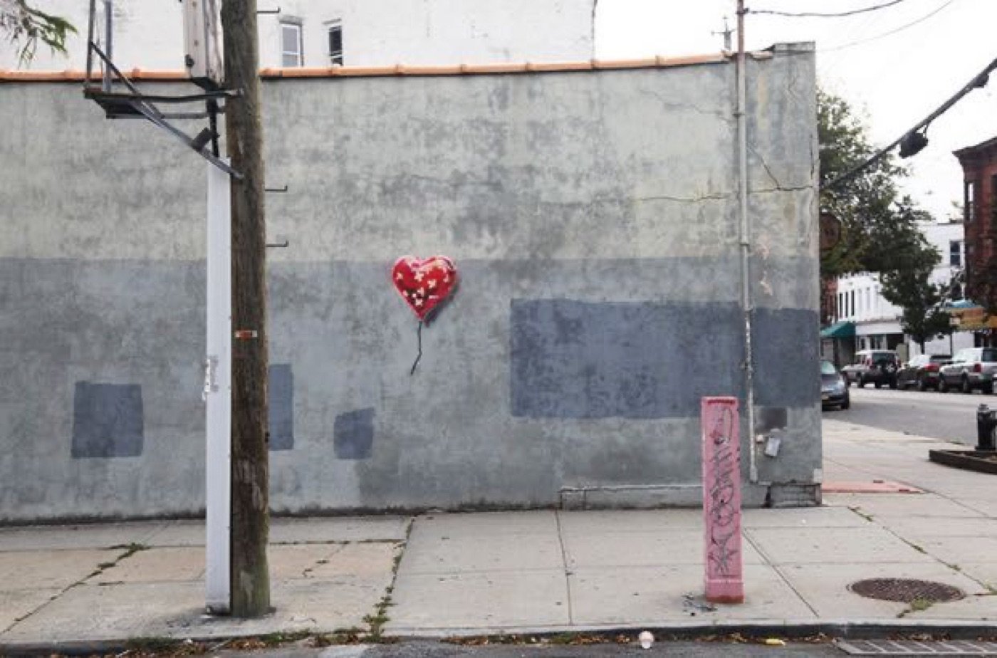The balloon painted on a Brooklyn wall during the Better Out Than In residency, New York.