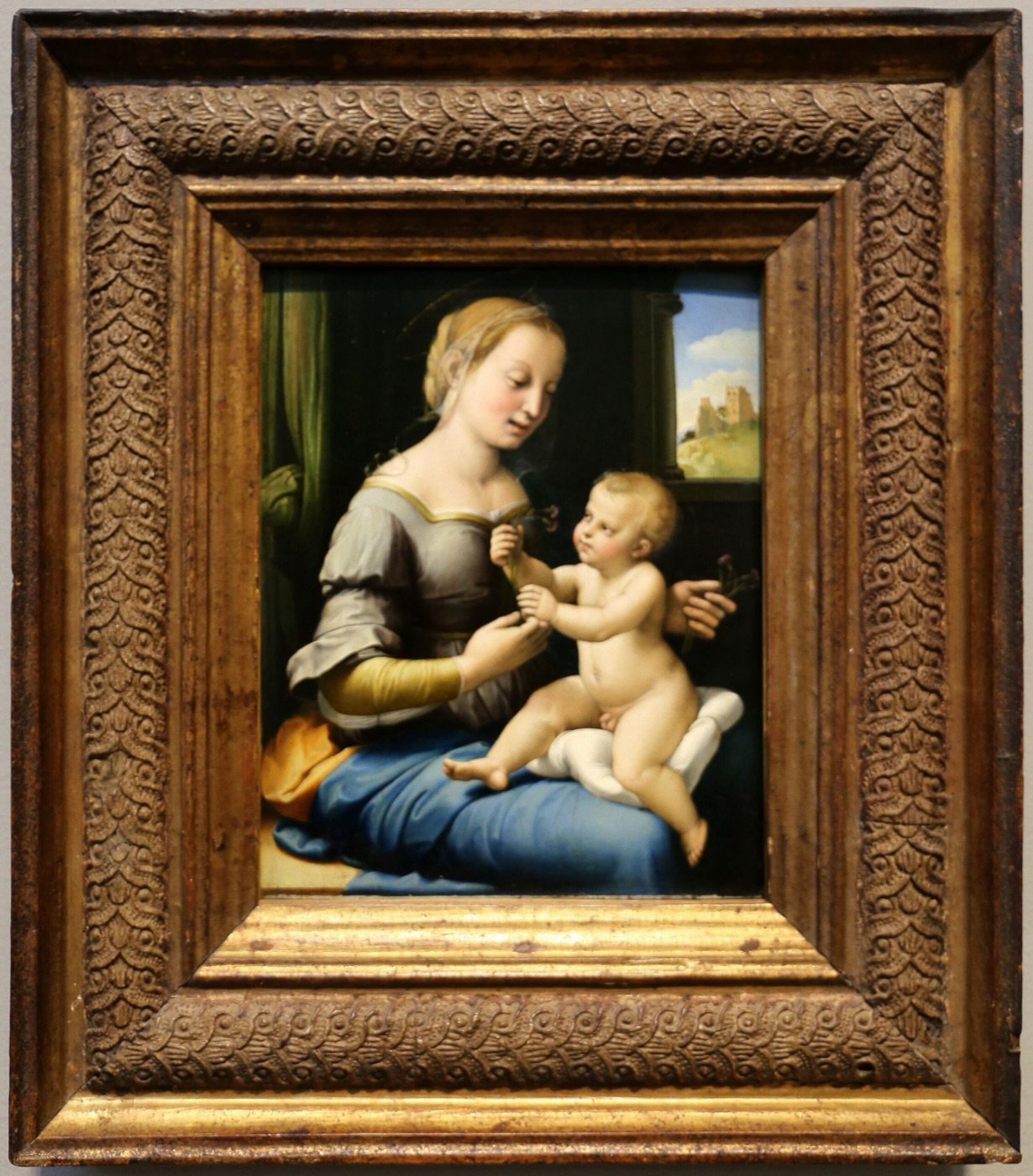 Raphael, Madonna and Child — the tradition Banksy inhabits.